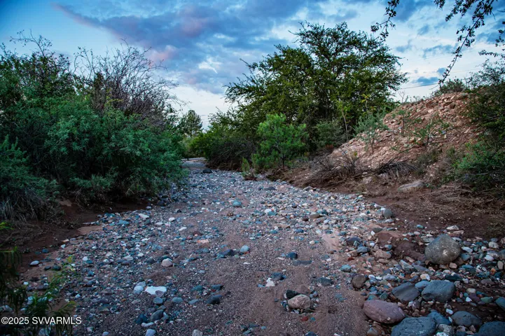 Gravel bottomed arroyo that crosses the lot-see aerial photo #29 showing location of the arroyo.