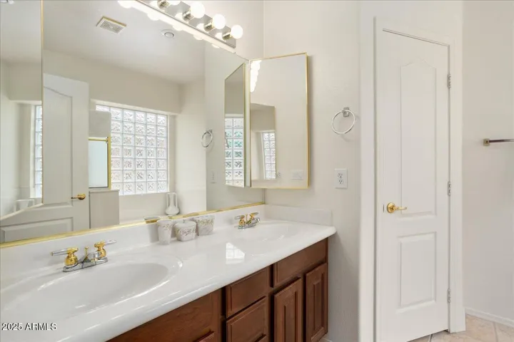 This bath is also ensuite and has double sinks, a private water closet, a shower and a GARDEN TUB!