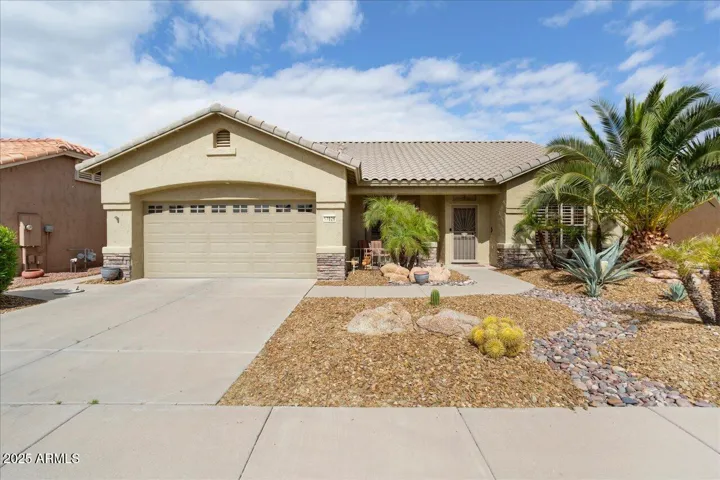 This special home has great curb appeal with stacked stone accents and offers low maintentance plants and trees so you can enjoy the community lifestyle!