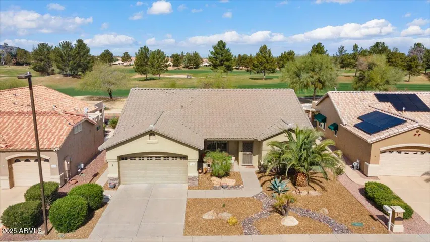 This lovely 2003 sf home offers vast golf course and mountain view in the guard-gated 55+ resort community of Arizona Traditions!