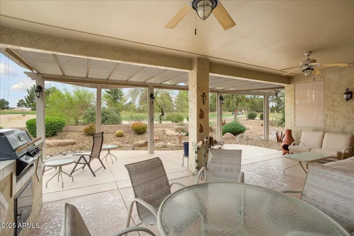 The patio was extended to maximize the use of the backyard space! This is a great space to entertain and enjoy the golf course and mountain views... and see special Arizona sunsets!
