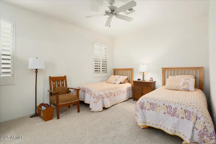 This opposite view shows the nice windows. The room could hold a king-sized bed between the windows! It is a large space!