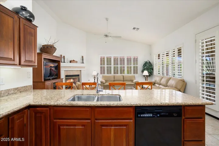 We are now looking over the kitchen sink and counter into the family room.