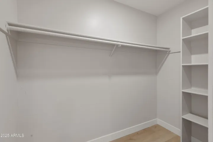 NORTH BEDROOM WALK-IN CLOSET