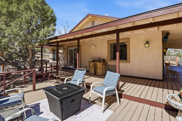 Relax on this spacious deck overlooking Mojave County desert landscape. Perfect for morning coffee or sunset views in Hackberry Arizona.