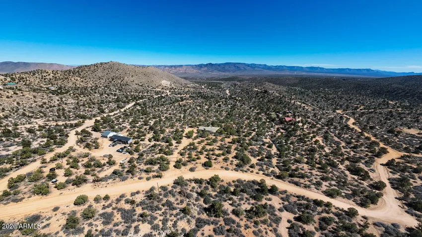 Breathtaking desert landscape at Spring Valley Ranches. Enjoy quiet, rural living with 360-degree views of the Mohave County mountains and valley.