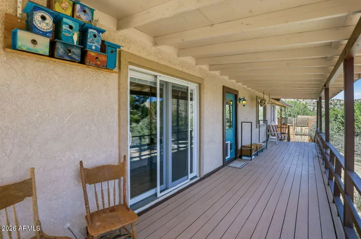 Long covered porch perfect for enjoying quiet desert living in Hackberry AZ near Kingman and the historic Route 66 corridor.