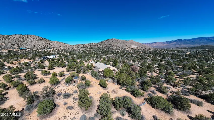 High-elevation aerial view of 7270 N Pine Valley Drive in Hackberry, AZ. Experience total privacy and panoramic mountain views in this desert sanctuary.
