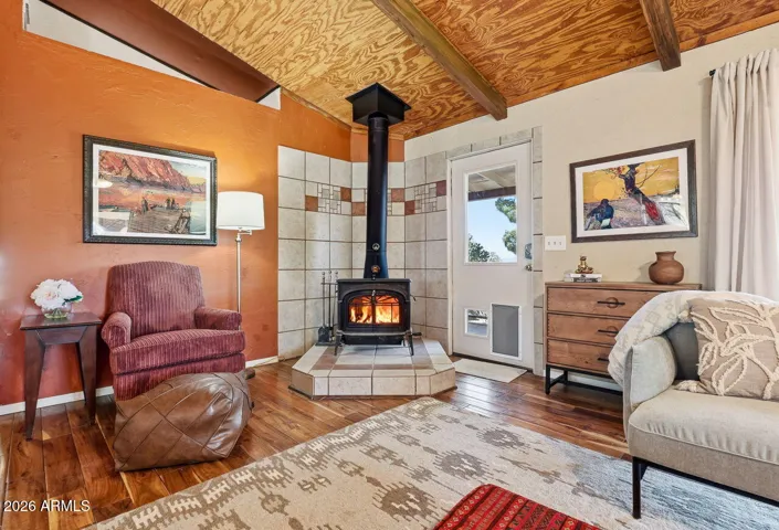 Cozy wood-burning stove anchors the living room. Warm desert retreat in Hackberry Arizona near Kingman and Mojave County recreation.