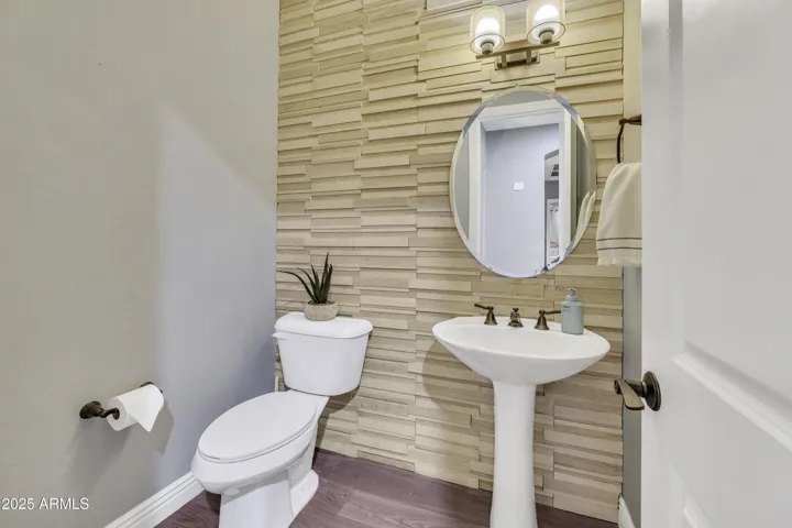 Powder room near kitchen