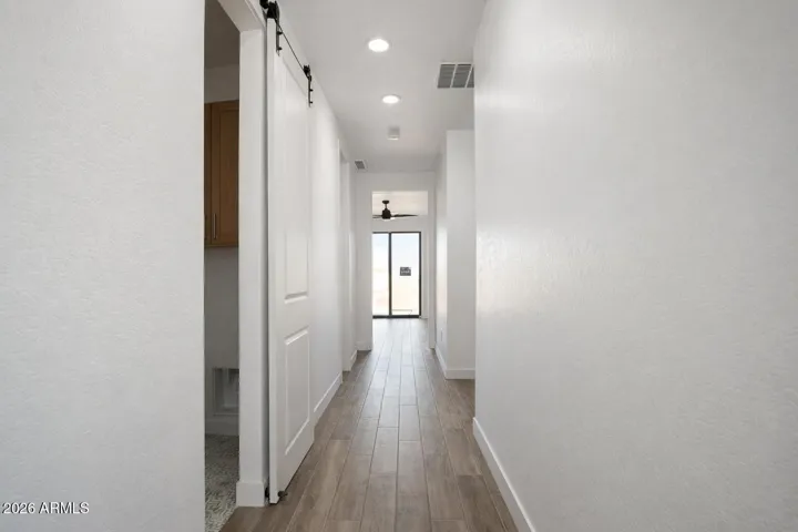 Barn door entry to laundry room!