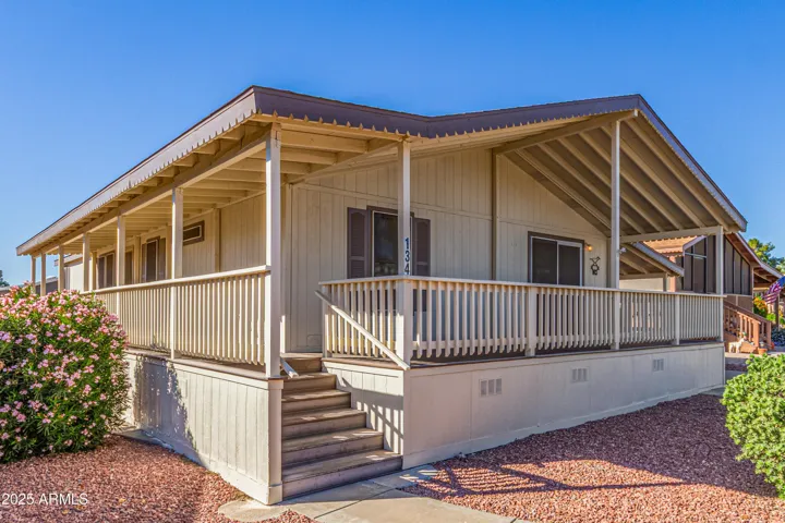 Front of home boasts a direct view of the pickle ball court! See who is playing before you walk over!