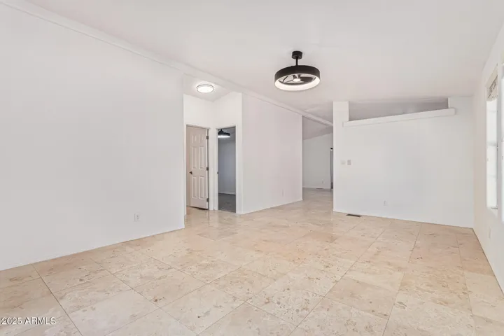 VAULTED ceilings and great room feel! Bedrooms 2, 3, and guest bath are served from this room.