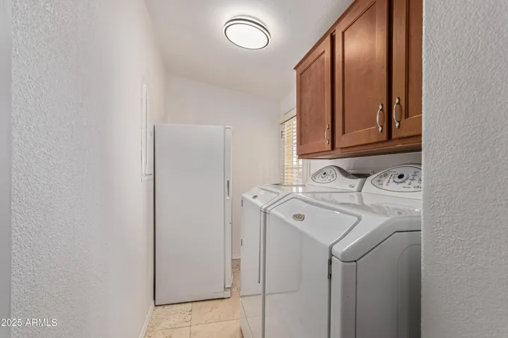 Maytag washer and dryer and full size freezer convey with property!
