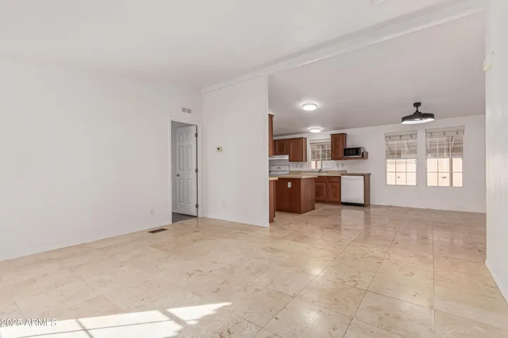 Great room feeds to the kitchen, dining area, master bedroom and Living area 1 to the right! Perfect spacing for two independent areas if desired.