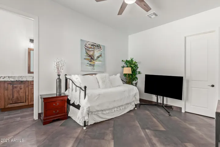 TWO TWIN BEDS, ONE IS UNDER THE DAYBED. PORTABLE TV. THREE TVS AVAILABLE.
