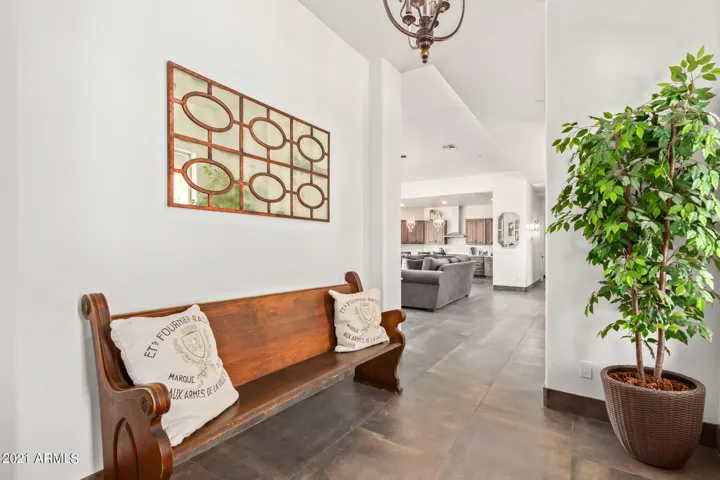 FRONT ENTRY HAS CLOSET, SEATING AREA, LEFT IS GUEST/OFFICE W/TWIN BEDS, FULL BATHROOM