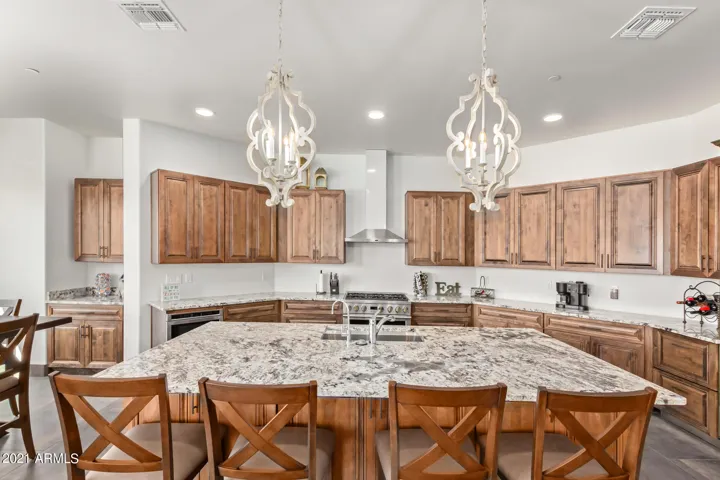 HUGE ISLAND SEATING, MONOGRAM, SUBZERO, BOSCHE, & THERMADOR APPLIANCES