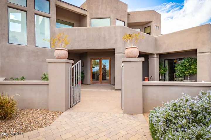 GATED COURTYARD TO FRONT OF HOME.