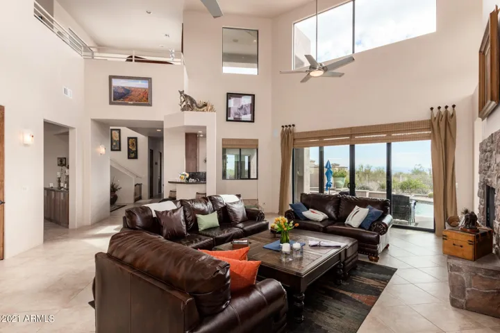 VIEW THE SECOND FLOOR DECK, LOFT LIVING AREAS AND TWO BEDROOMS.
