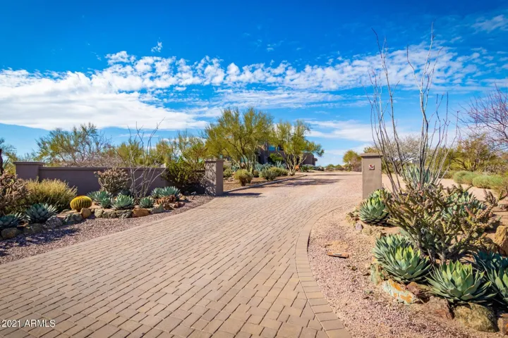 PAVED STREETS, LONG PRIVATE DRIVEWAY, ROOM FOR RV GARAGE, OR RV PARKING, SEPARATE BARN.