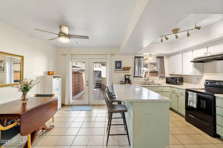 Lovely kitchen with privacy out back.