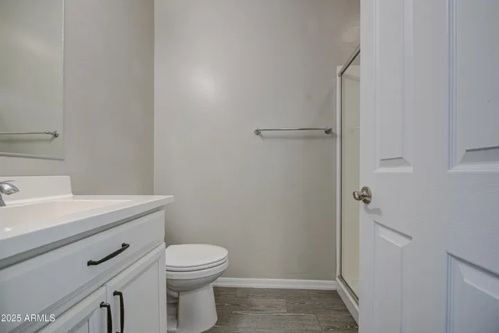 Downstairs bathroom 3 with walk-in shower provides convenient access for guests.