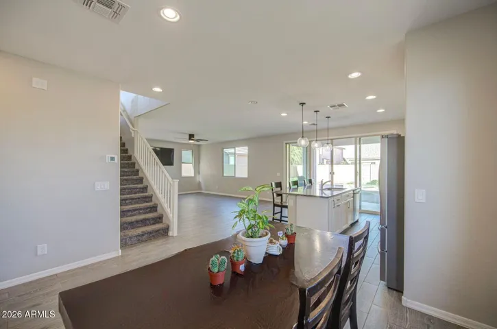 Dining area, greatroom, and staircase to level 2.