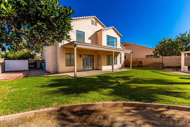 The backyard boasts different spaces for entertainment, zen, sports, leisure, and space to add a pool!
