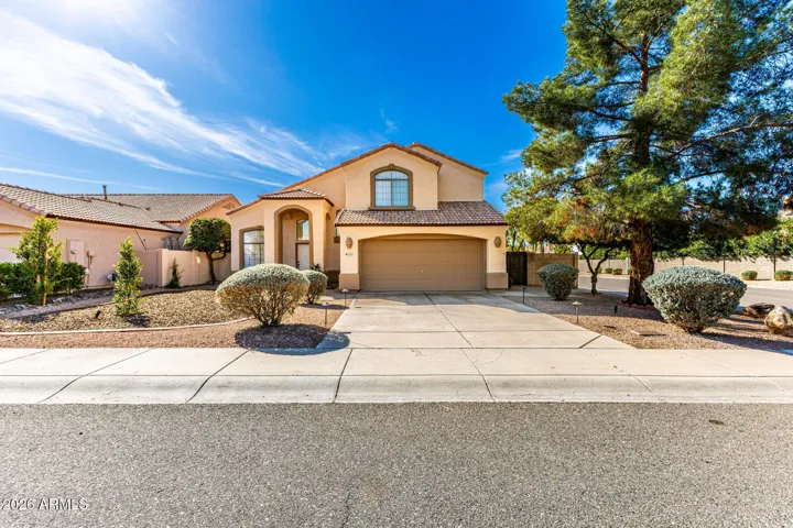 Welcome Home! Large corner lot with low maintenance landscaping. You should see me shine at night!
