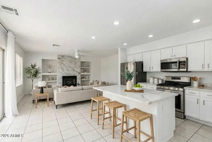 Kitchen island with plenty of counterspace to prepare meals and entertain!