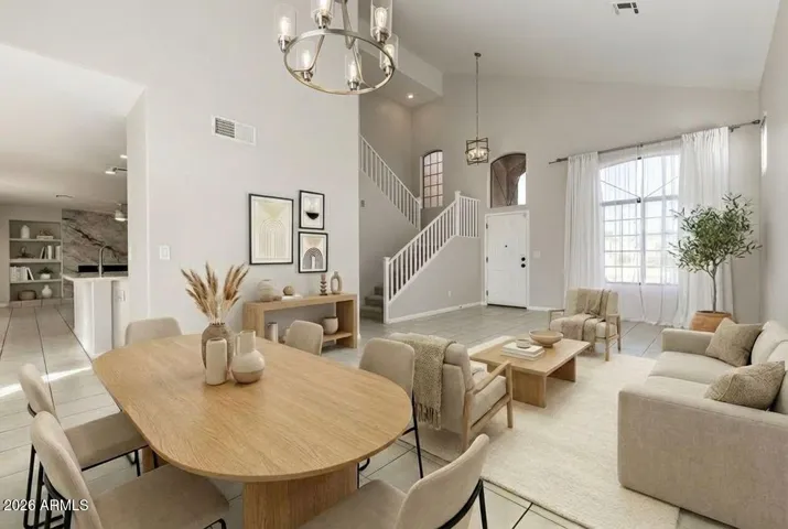 Great Room with dining room and seating area. Virtually Staged