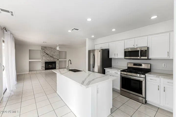 Stainless Steel appliances and hardware in the kitchen and throughout the home.