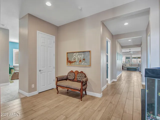 Foyer/entry way with coat closet and additional space for welcome decor