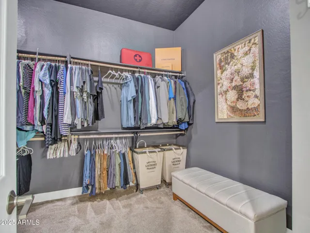 Huge primary closet with tons of space