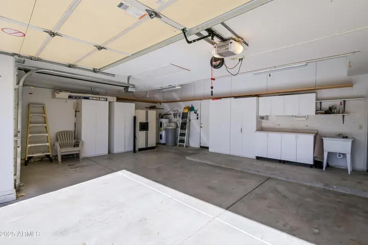 3 Car Garage with add'l refrigerator and water softener