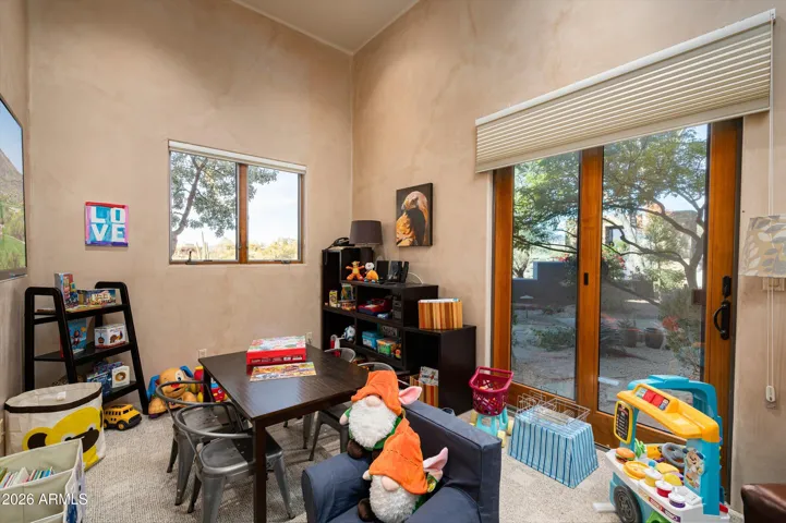 Air-conditioned room off garage for office or play room with outside access