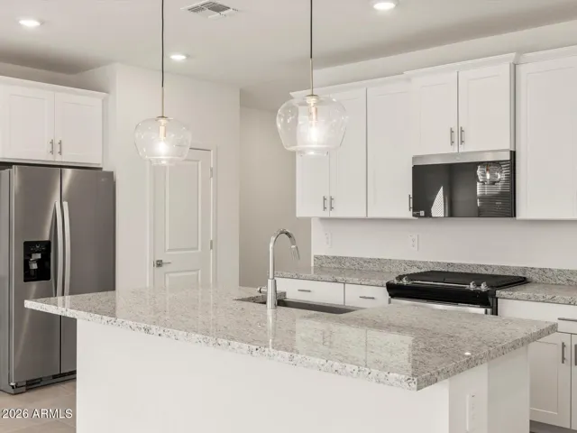 Photo is not of the actual home. Interior finishes and fixtures may vary