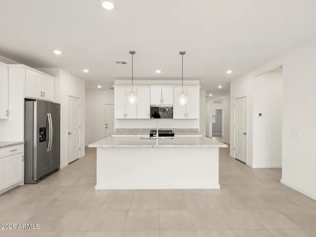 Photo is not of the actual home. Interior finishes and fixtures may vary