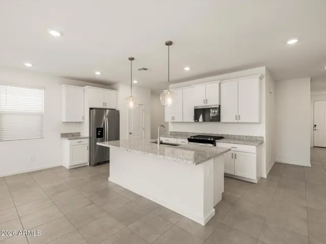 Photo is not of the actual home. Interior finishes and fixtures may vary