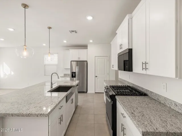 Photo is not of the actual home. Interior finishes and fixtures may vary