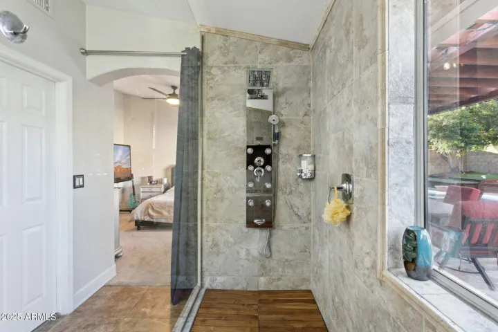 Shower with view of outdoors