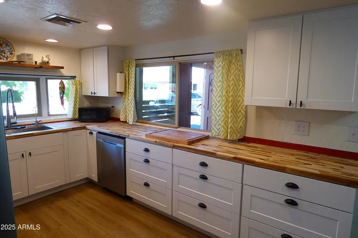 Lots of cabinets for all the necessary pots, pans & gadgets!