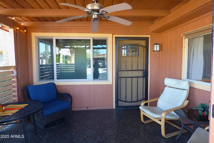 Cozy front patio for morning reading or evening social hour! Ft security screen door!