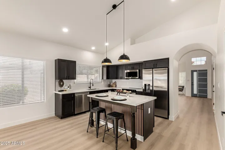 All new quartz countertops, shaker cabinets, stainless steel appliances.