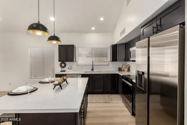 All new quartz countertops, shaker cabinets, stainless steel appliances.