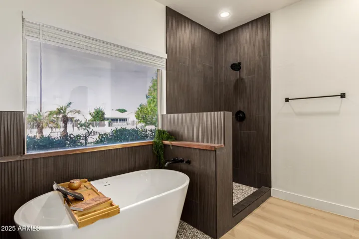 Soaking tub, glass tiled shower