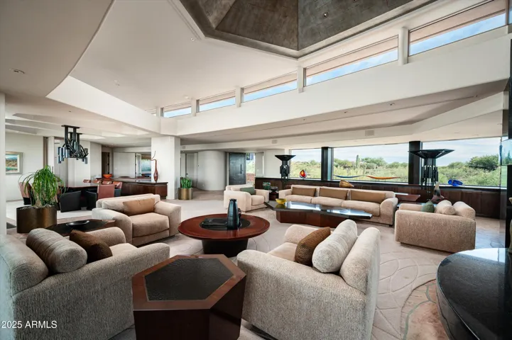 Great room is open to wet bar and dining