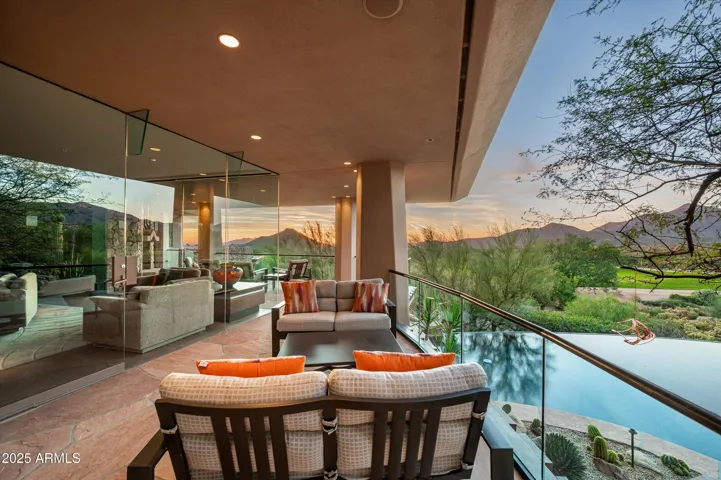 Entertaining space with pool and golf course views
