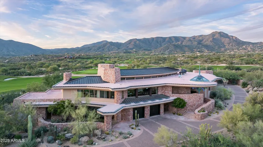 5 car garage, 3 on main level, 2 below, direct access from lower garage to casita